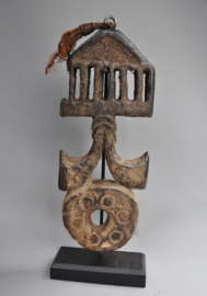 Nepalese ghurra – churning stick holder with cosmic symbolism