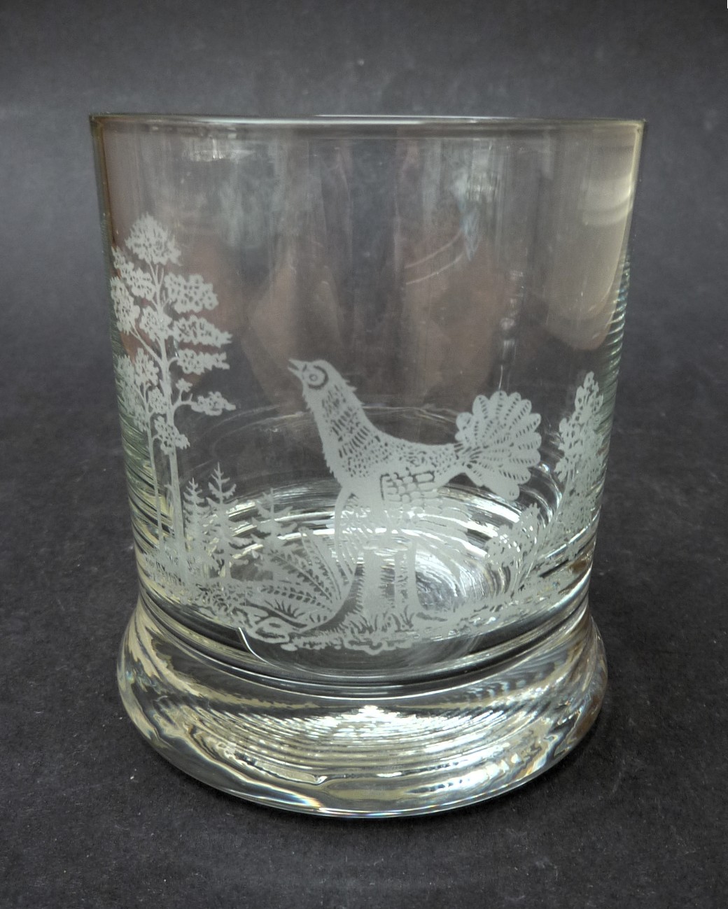 A pair of etched crystal whisky tumblers