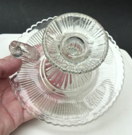 A pair of pressed glass chambersticks 1930s