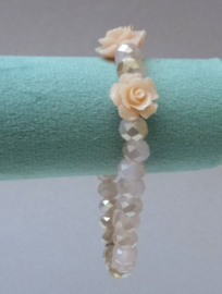 Biba armband roze facetkralen en roosjes