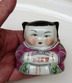 A pair of Chinese famille rose porcelain boy girl figurines