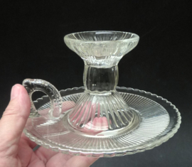 A pair of pressed glass chambersticks 1930s