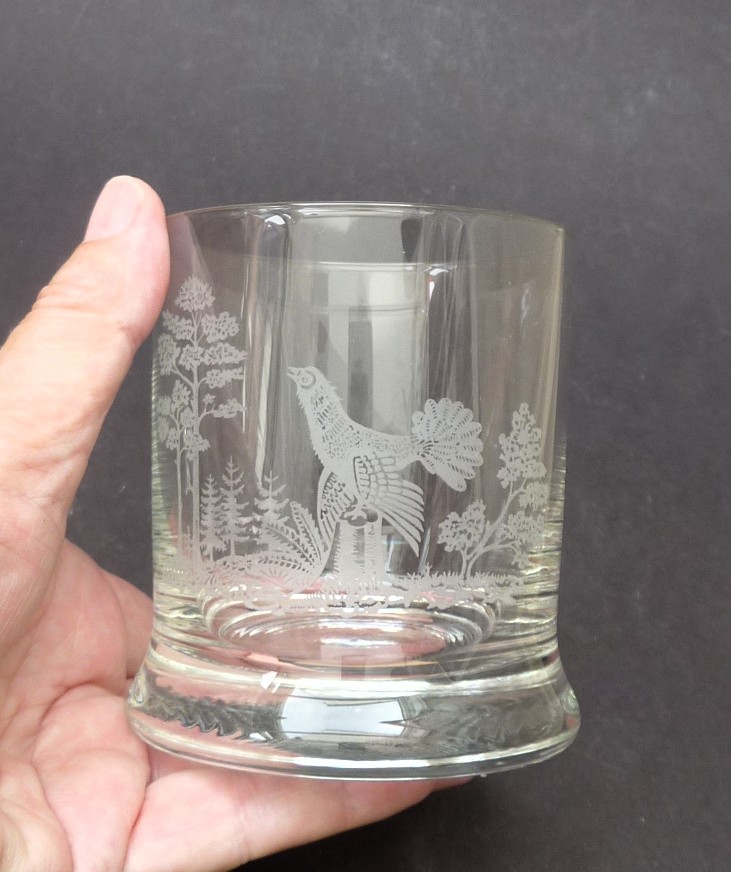 A pair of etched crystal whisky tumblers