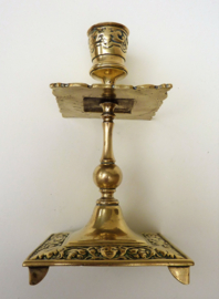 A pair of Victorian brass candlesticks