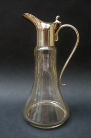 Art deco glass claret jug with white metal mounting