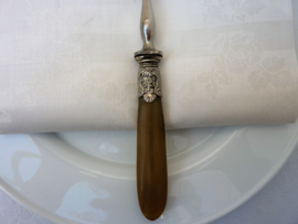 Meat serving fork with bone grip