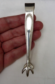Silver plated sugar tongs with beaded edge