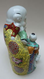 Large Chinese porcelain sitting Budai with five playing boys