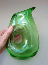 Hand blown green glass pitcher with hole