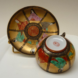 Kutani Taisho porcelain cup with saucer