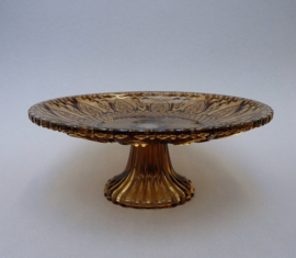 KIG Maleisie - Fleur de Lis - amber pressed glass pedestal serving plate