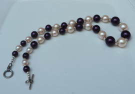 Elegant ivory and amethyst faux pearl necklace