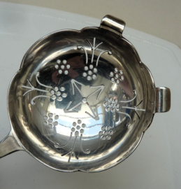 English Art Deco silver plated tea strainer