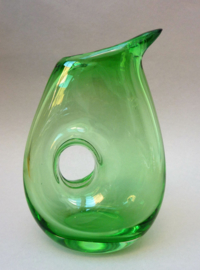 Hand blown green glass pitcher with hole