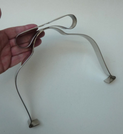 Verzilverde bordklem met strik