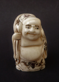 Japanese hand carved bone Netsuke Traveling Monk