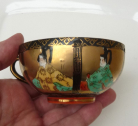 Kutani Taisho porcelain cup with saucer