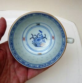 Chinese Wanyu rice grain porcelain tea cup with saucer