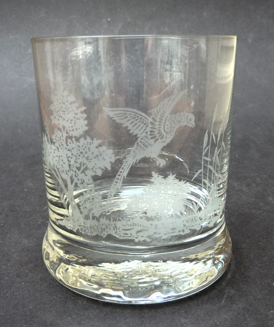 A pair of etched crystal whisky tumblers