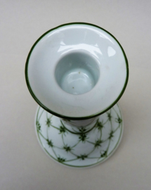 A pair of green sprig porcelain candlesticks