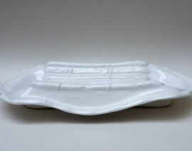 White faience asparagus serving dish