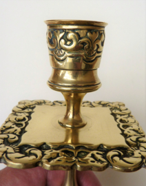 A pair of Victorian brass candlesticks