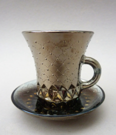 Carnival glass copper cup with saucer