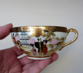 Suzuki Geishaware porcelain tea cup with saucer