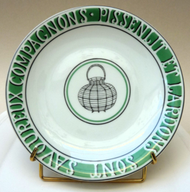 Porcelaine de Paris saladeborden in metalen draadmand