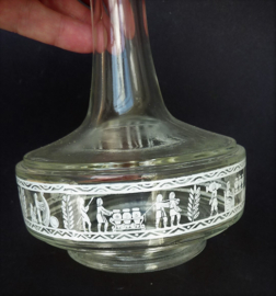 A pair of Belgian Mid Century glass decanter bottles Roman print
