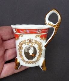 German footed porcelain cabinet cup with portrait