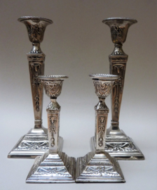 Silver plated and white metal candlesticks