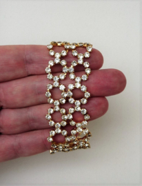 Goudkleurige armband met diamant strass steentjes