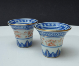 A pair of  Chinese Wanyu rice grain porcelain Baijiu bowls