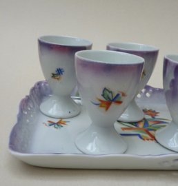 Art Deco lusterware porseleinen eierdopjes op schaal