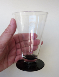 A pair of Art Deco water tumblers with black foot