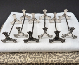 Silver plated knife rests