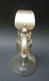 Art deco glass claret jug with white metal mounting