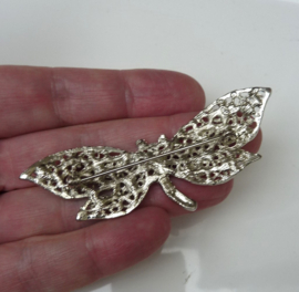 Silver tone dragonfly brooch with rhine stones