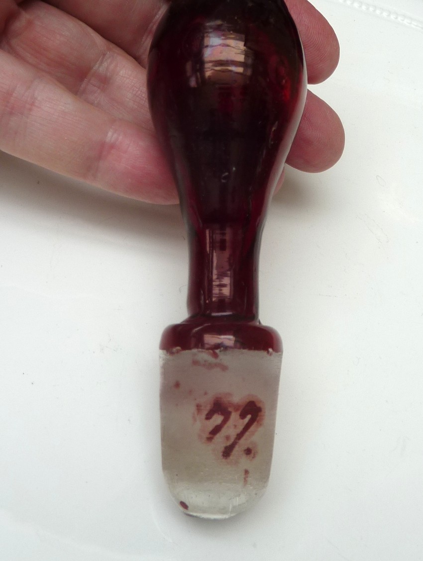 A pair of Bohemian ruby red glass bottle decanters late 19th century