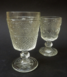 A pair of 19th century Voneche Baccarat pressed glass wine goblets