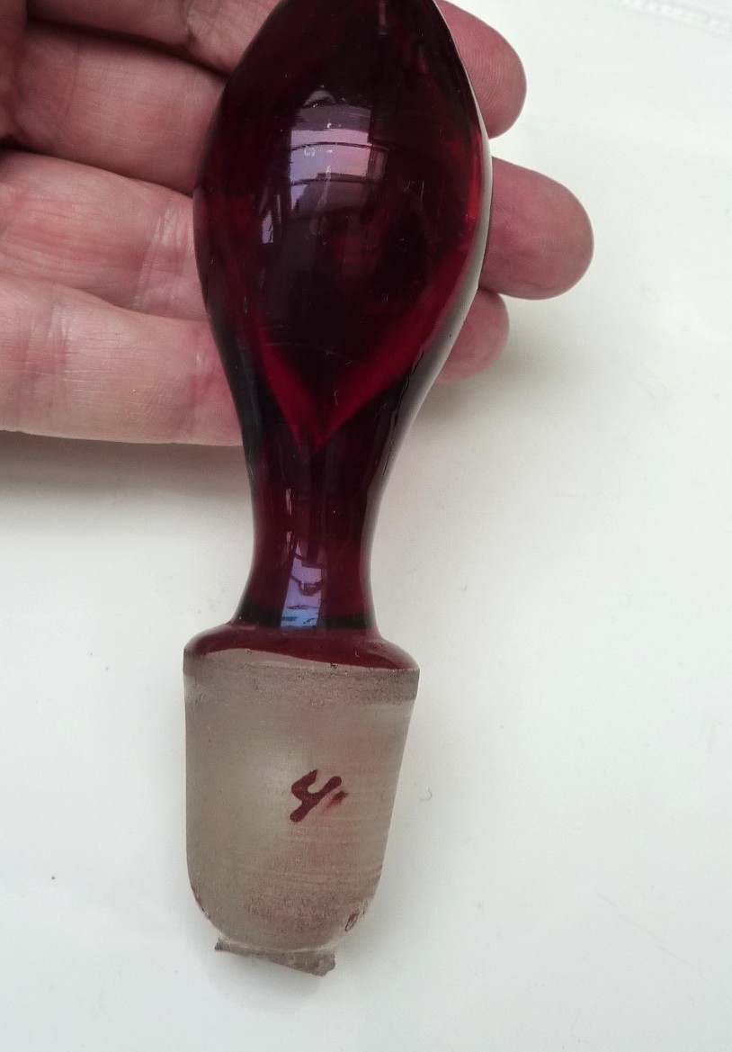 A pair of Bohemian ruby red glass bottle decanters late 19th century