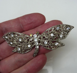 Silver tone dragonfly brooch with rhine stones