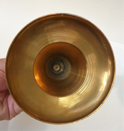 A pair of brass and mother of pearl candlesticks