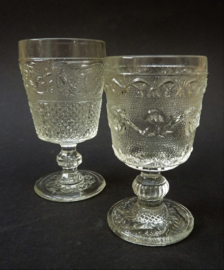 A pair of 19th century Voneche Baccarat pressed glass wine goblets