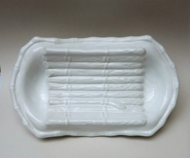 White faience asparagus serving dish