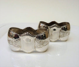 A pair of Art Nouveau silver plated napkin rings