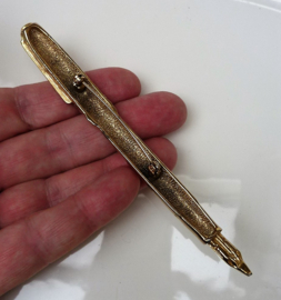 Gold tone fountain pen brooch