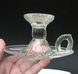 A pair of pressed glass chambersticks 1930s