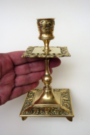 A pair of Victorian brass candlesticks